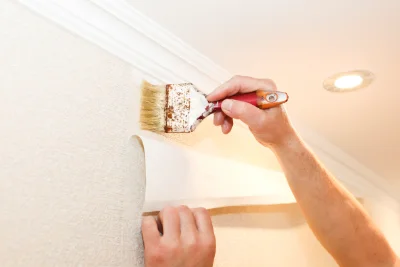 Pose de papier peint à Thénouville — revêtements muraux et toiles de verre